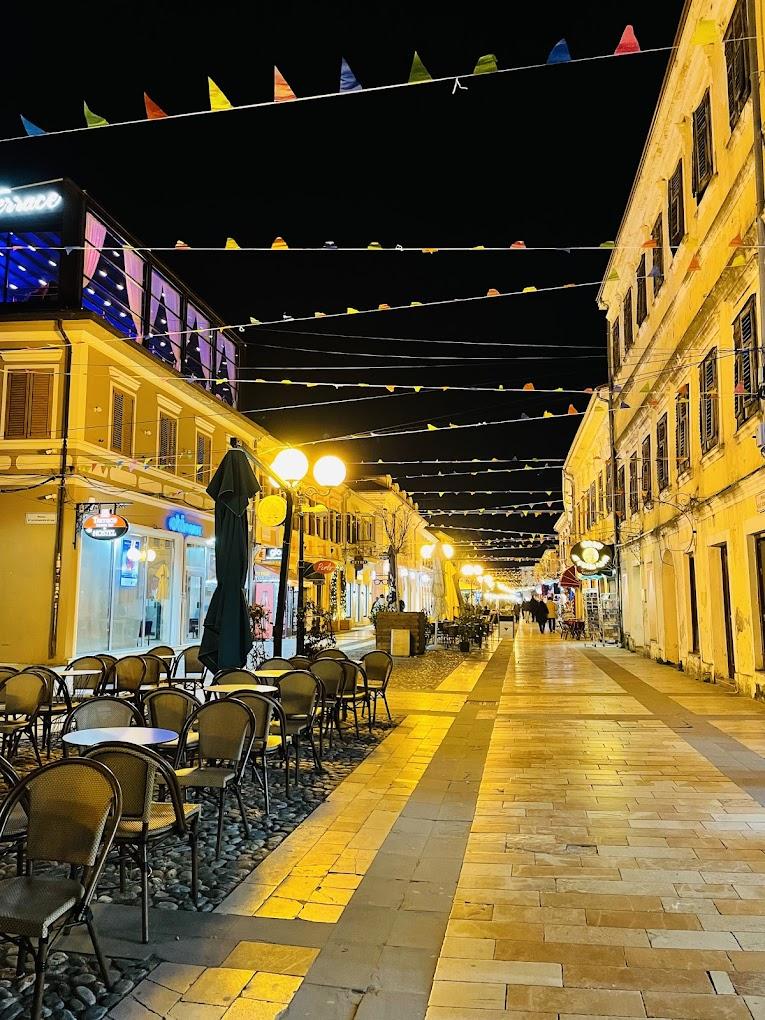 Pedestrian street scene near Scodrinon Hostel on Kolë Idromeno, Shkoder